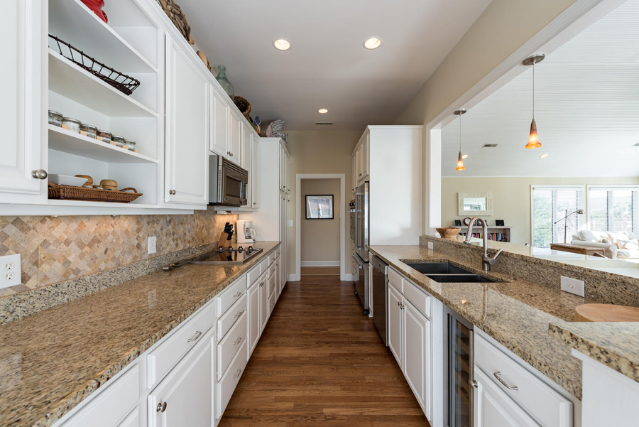 spacious kitchen with granite counters