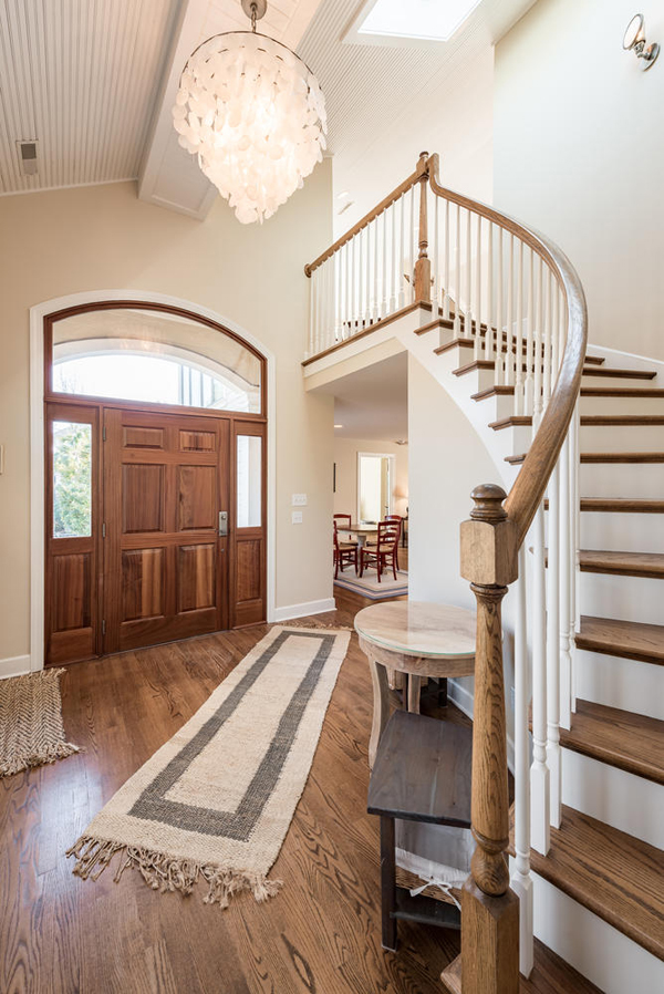 interior picture of beach house with staircase and foyer