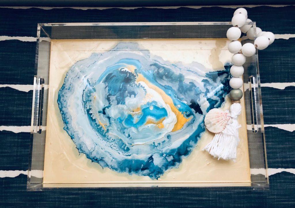 Blue Moon Art piece that resembles a blue and sea green oyster shell, complete with beige beading on the end