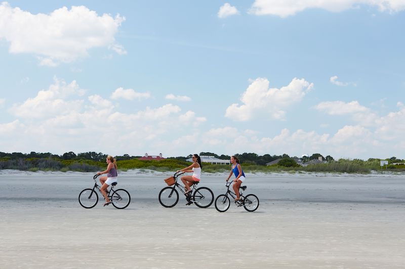 riding bikes on the beach